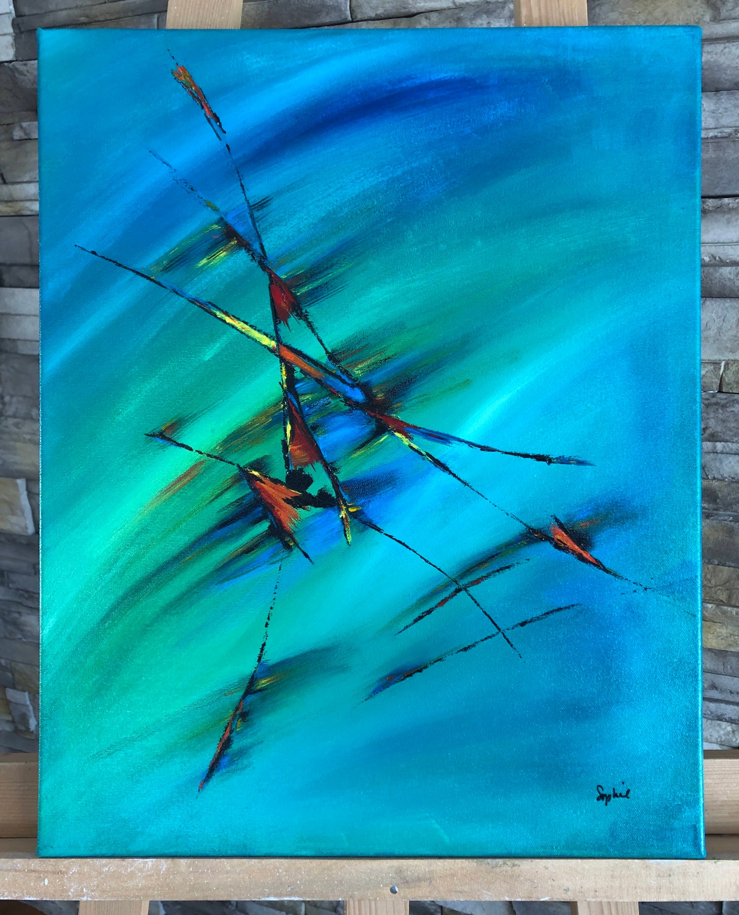 toile oiseaux du paradis sur un chevalet