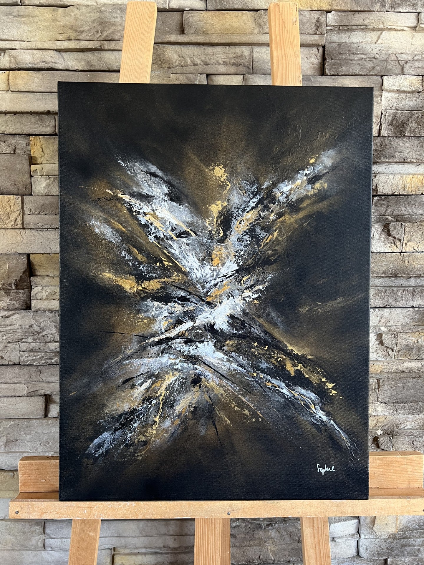 toile sortir de l'ombre sur un chevalet