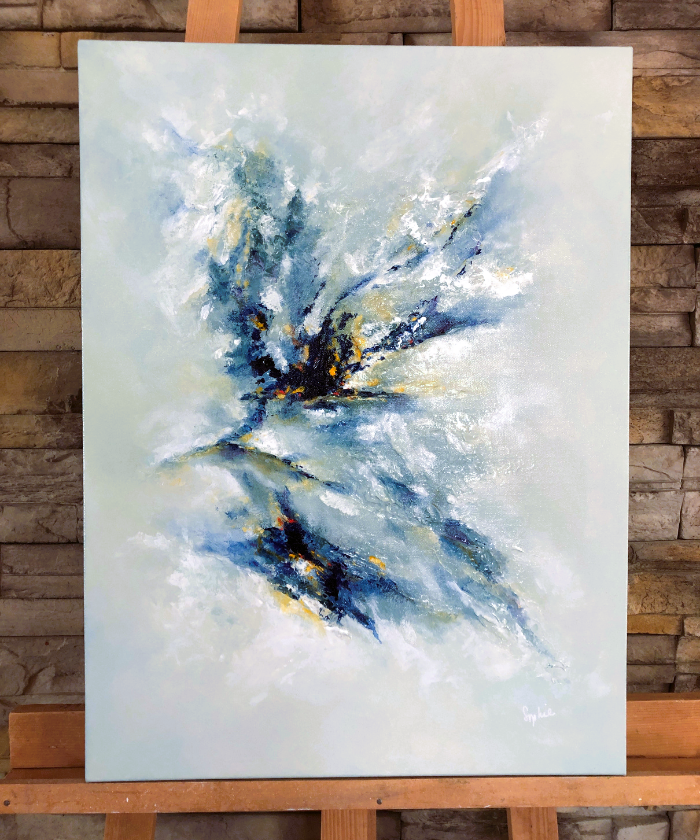 toile symbiose sur un chevalet