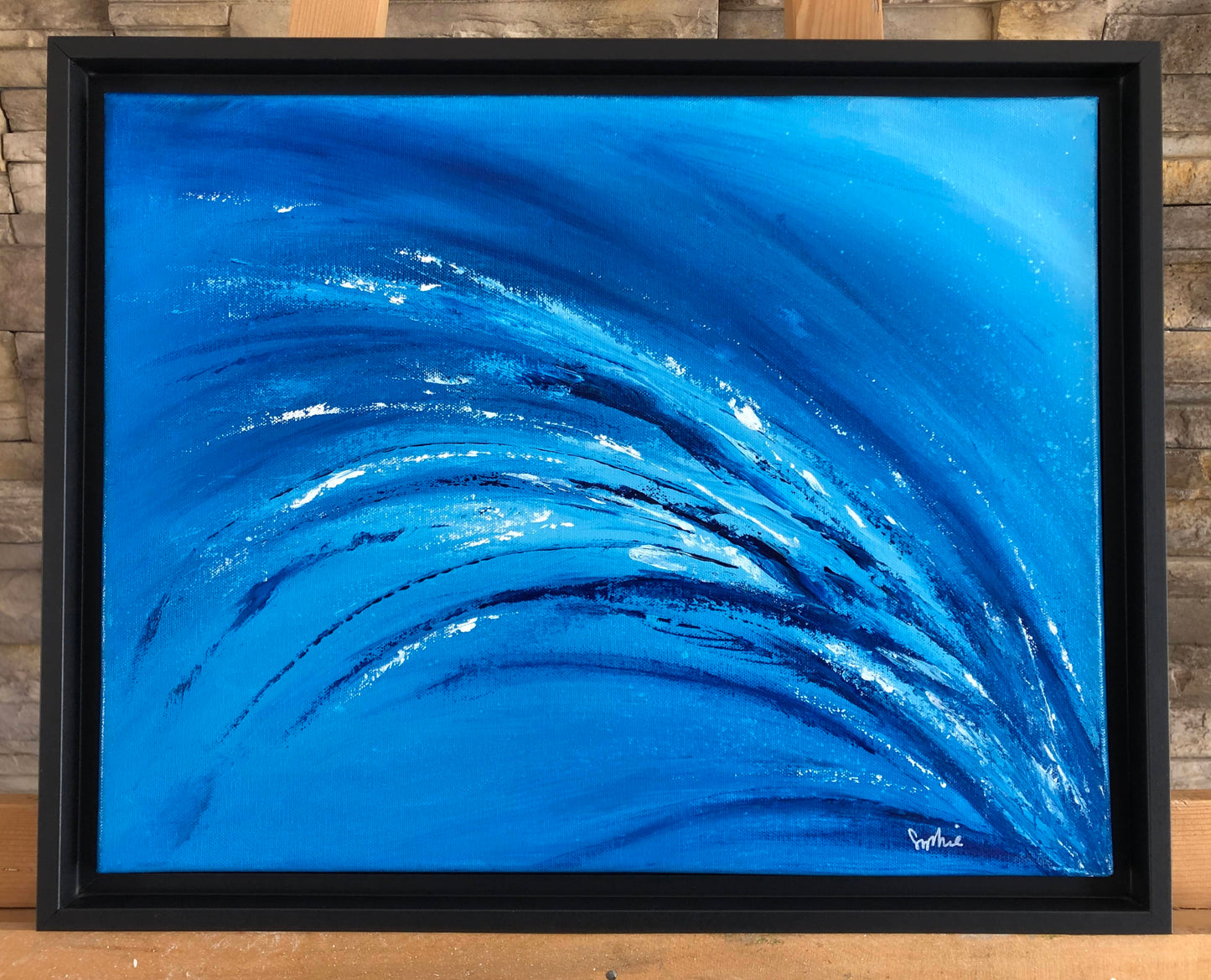 toile vague déferlante sur un chevalet